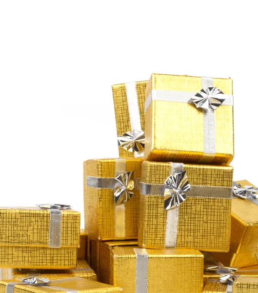 Pile of gold gift boxes — Stock Photo, Image