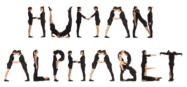 Black dressed people forming HUMAN ALPHABET word over white — Stock Photo, Image