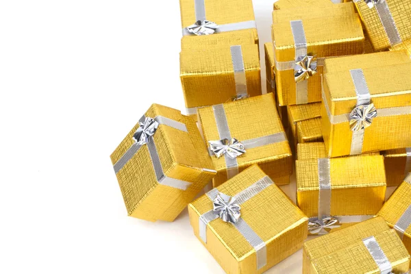 Pile of gold gift boxes — Stock Photo, Image