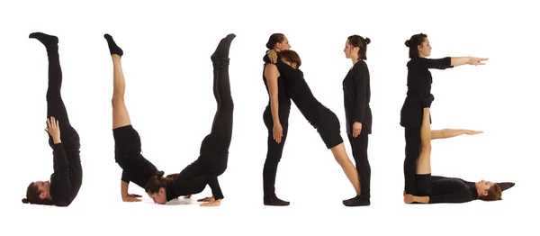 Black dressed people forming JUNE word over white — Stock Photo, Image