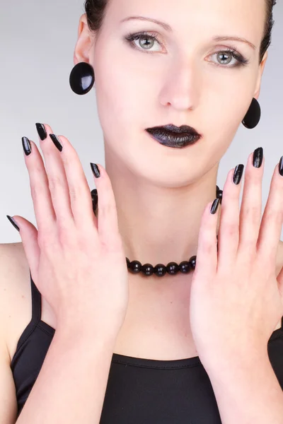 Close-up portrait of beautiful woman with blue eye shadow make up and manicure — Stock Photo, Image