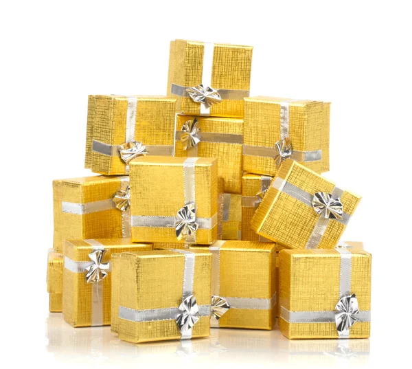 Hromadu zlata dárkové krabičky — Stock fotografie