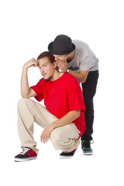 Man whispering a secret to another guy — Stock Photo, Image