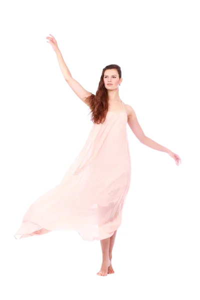 Graceful girl in flying light pink dress — Stock Photo, Image