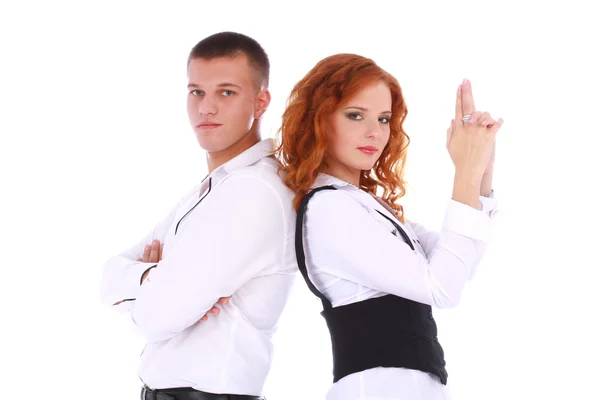 Young couple in business dresses showing gun with hands — Stock Photo, Image