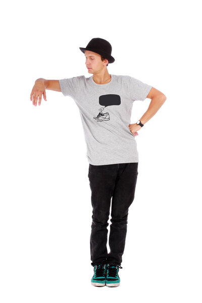 Young guy in a hat and casual t-shirt half length portrait