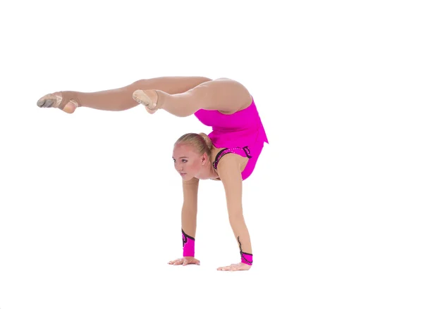 Gymnastic girl standing on hands — Stockfoto