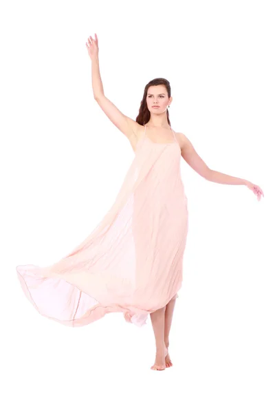 Graceful girl in flying light pink dress — Stock Photo, Image