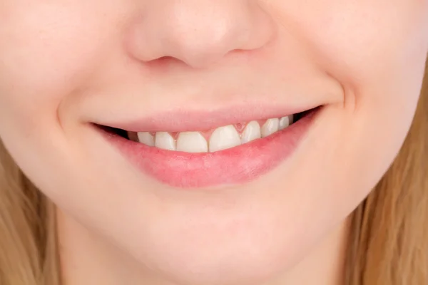 Vrouwelijke glimlach close-up — Stockfoto