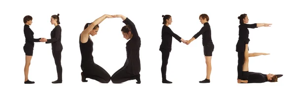 Black dressed people forming HOME word over white — Stock Photo, Image