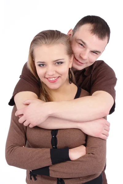 Loving couple embracing on white background — Stock Photo, Image