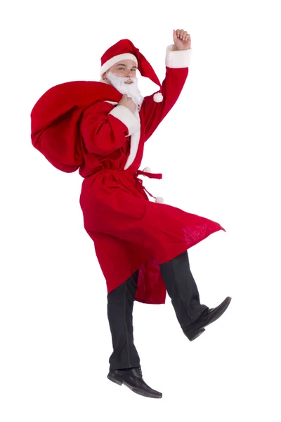 Santa Claus on the run to delivery christmas gifts — Stock Photo, Image