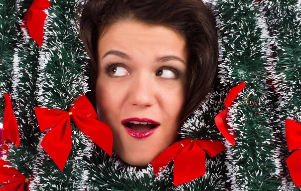 Woman with tinsel — Stock Photo, Image