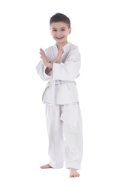 A young boy fighter in white kimono isolated on white background — Stock Photo, Image