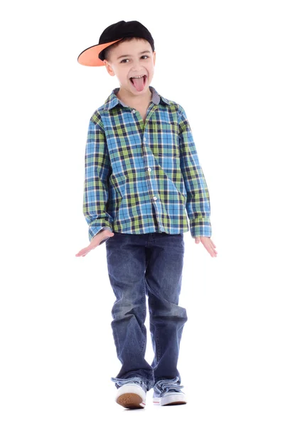 Retrato completo de niño sonriente en jeans y copa bailando hip-hop sobre fondo blanco —  Fotos de Stock