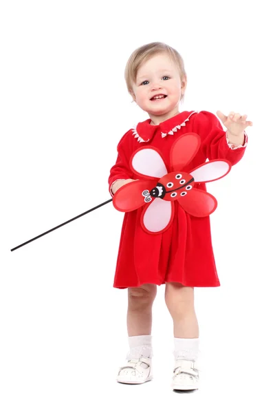 Retrato brillante de jugar adorable niña con juguete rojo sobre blanco —  Fotos de Stock