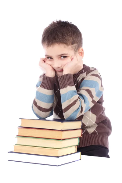 Niño con libros aislados sobre fondo blanco —  Fotos de Stock