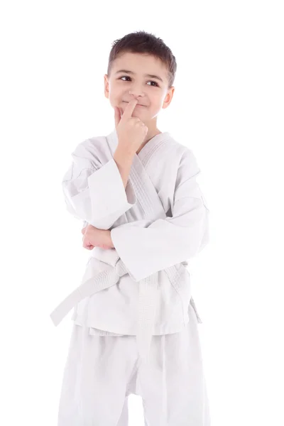 A young boy fighter in white kimono isolated on white background — Stock Photo, Image
