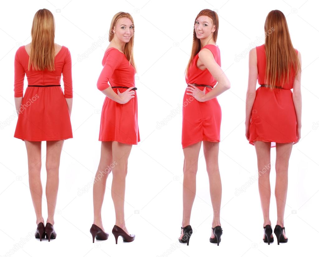 Two girls twins in red dresses isolated on the white