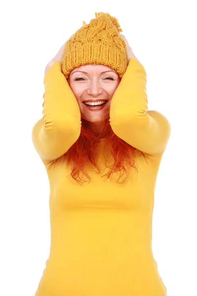 Emotional woman in yellow hat and blouse — Stock Photo, Image