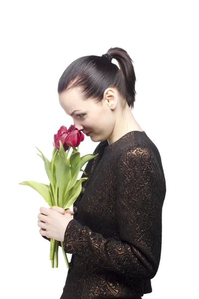 Woman sniff red tulips isolated on white — Stock Photo, Image