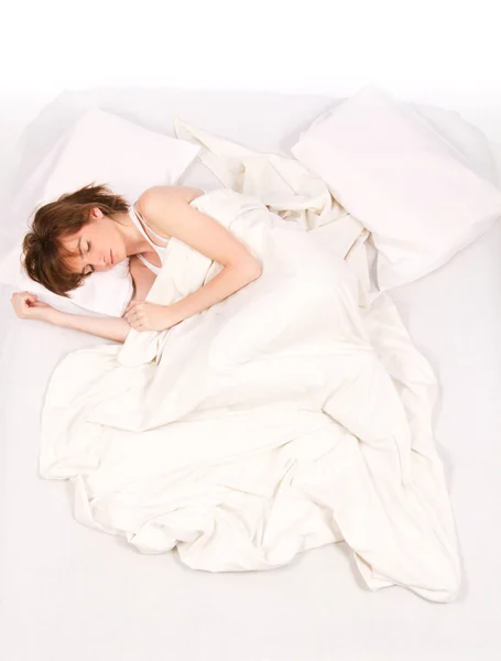 Roztomilá žena se zavřenýma očima spí — Stock fotografie