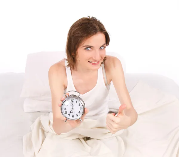 Vrouw wakker in bed. Rechtenvrije Stockfoto's