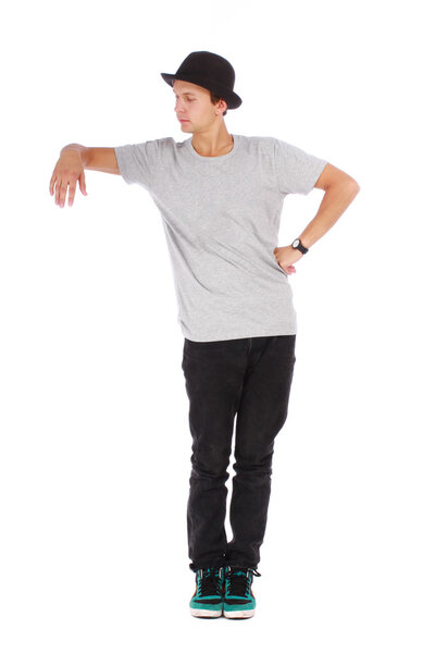 Young handsome guy with a modern clothes and a hat