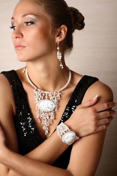 Beautiful portrait of woman with jewelry — Stock Photo, Image