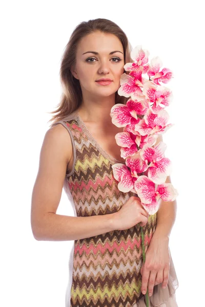 Woman with pink orchid — Stock Photo, Image