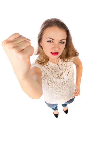 Mujer mostrando puño sobre fondo blanco —  Fotos de Stock