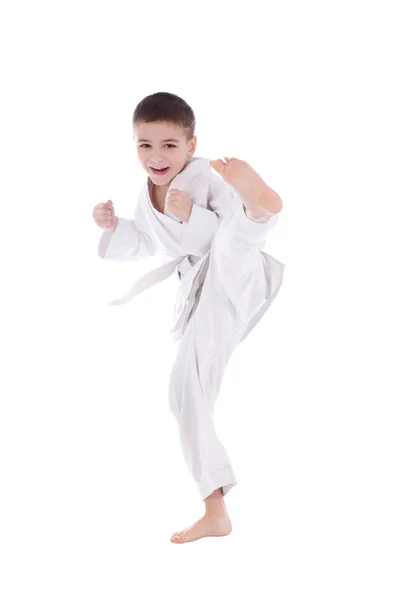 Young boy training kick — Stock Photo, Image