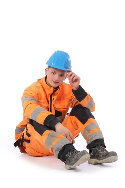 Retrato de um trabalhador com macacão e chapéu duro — Fotografia de Stock