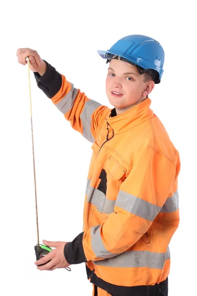 Portrett av en arbeidsmann med kjeledress og hard hatt med linjal – stockfoto