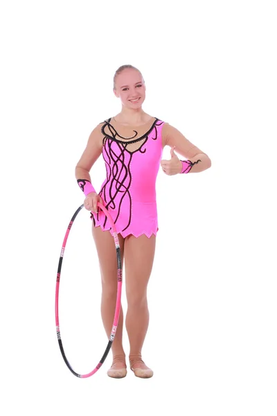 Beautiful slim girl gymnast in a costume with a hoop — Stock Photo, Image