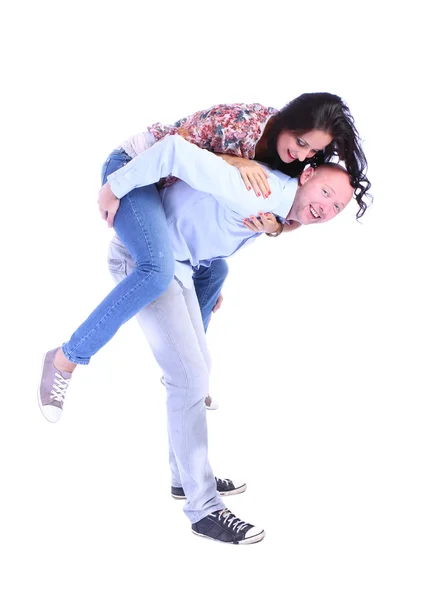 Man giving woman piggyback ride — Stock Photo, Image