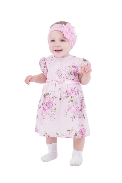 Bébé fille souriante en robe rose — Photo