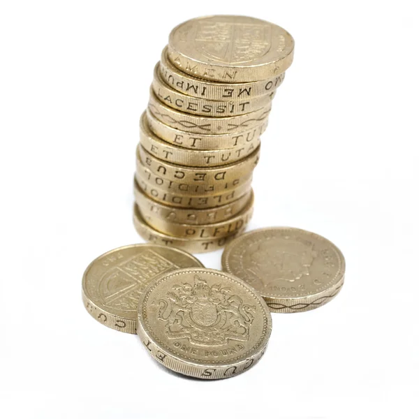 Один фунт монет — стоковое фото