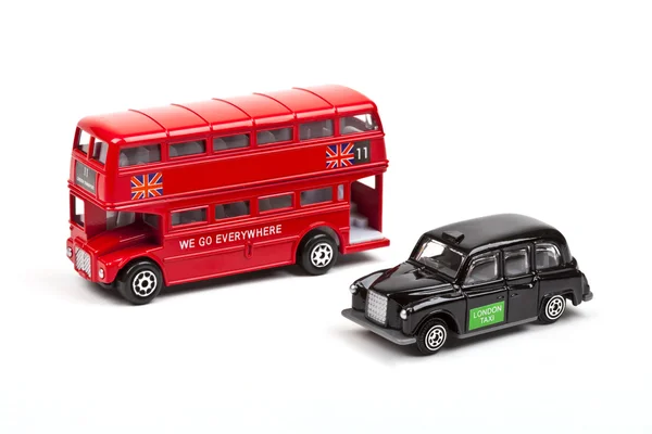 London röd buss och taxi — Stockfoto