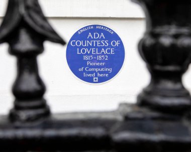 London, UK - May 13th 2021: A blue plaque in St. Jamess Square in London, marking the location where Ada Countess of Lovelace once lived, a Pioneer of Computing. clipart