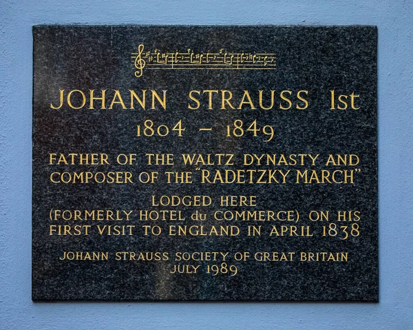 A plaque on Leicester Street, near Leicester Square in London, UK, marking the location where famous composer Johann Strauss once lodged in 1838.