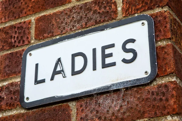 Close Ladies Sign Brick Wall — Stock Photo, Image