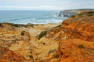 Deserted coast near Cavaleiro on the Rota Vicentina route in western Portugal