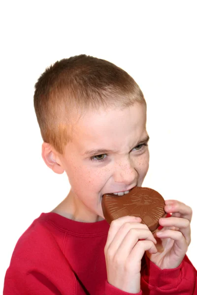 Intense Boy Biting Coração de Chocolate 2 — Fotografia de Stock