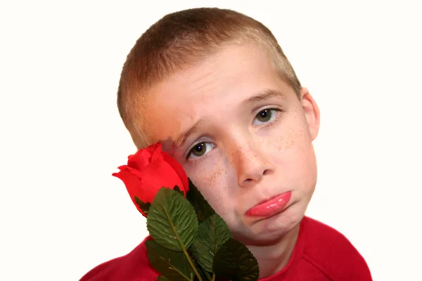 Ragazzo triste con rosa rossa — Foto Stock