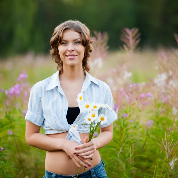 Girl with a bouquet — Stock Photo, Image