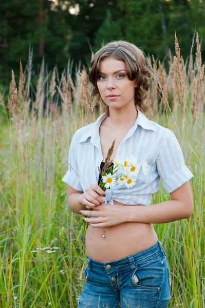 Girl with a bouquet — Stock Photo, Image