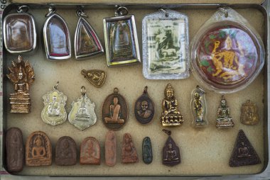buddhist amulets in bangkok thailand clipart