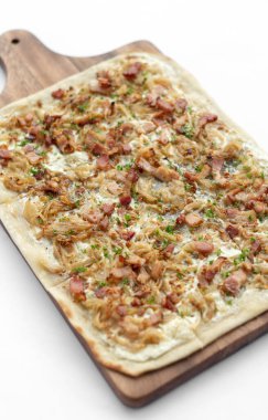 Flammkuchen tarte flambee rectangular pizza with bacon and chicken on white background