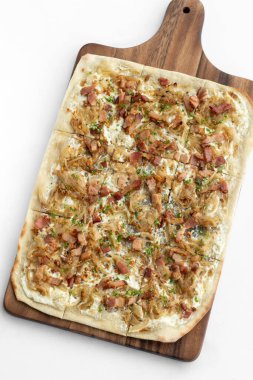 Flammkuchen tarte flambee rectangular pizza with bacon and chicken on white background